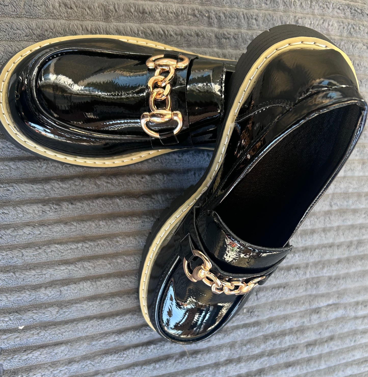 Shoe black and gold